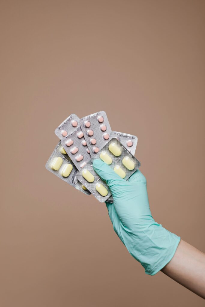 Person Holding Medicines